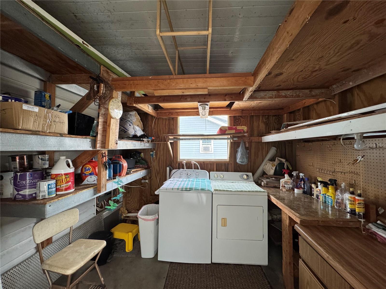 Attached shed with washer/dryer