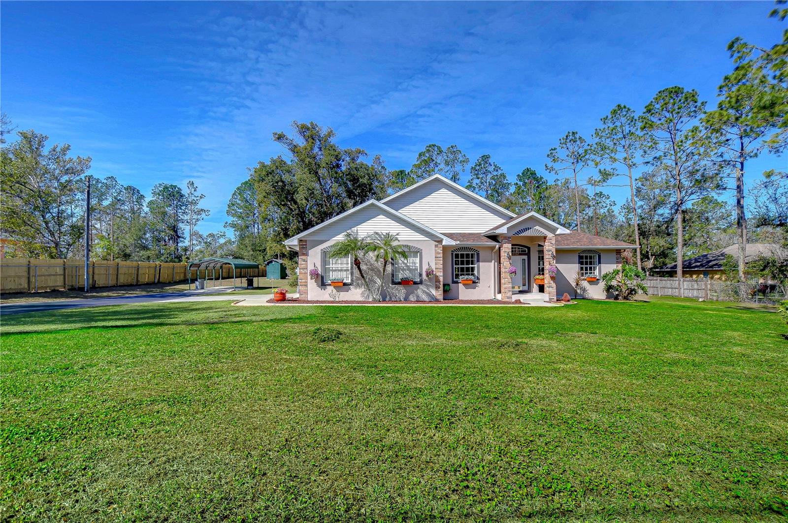 Discover the charm of this delightful home, featuring  natural beauty and a tranquil setting.