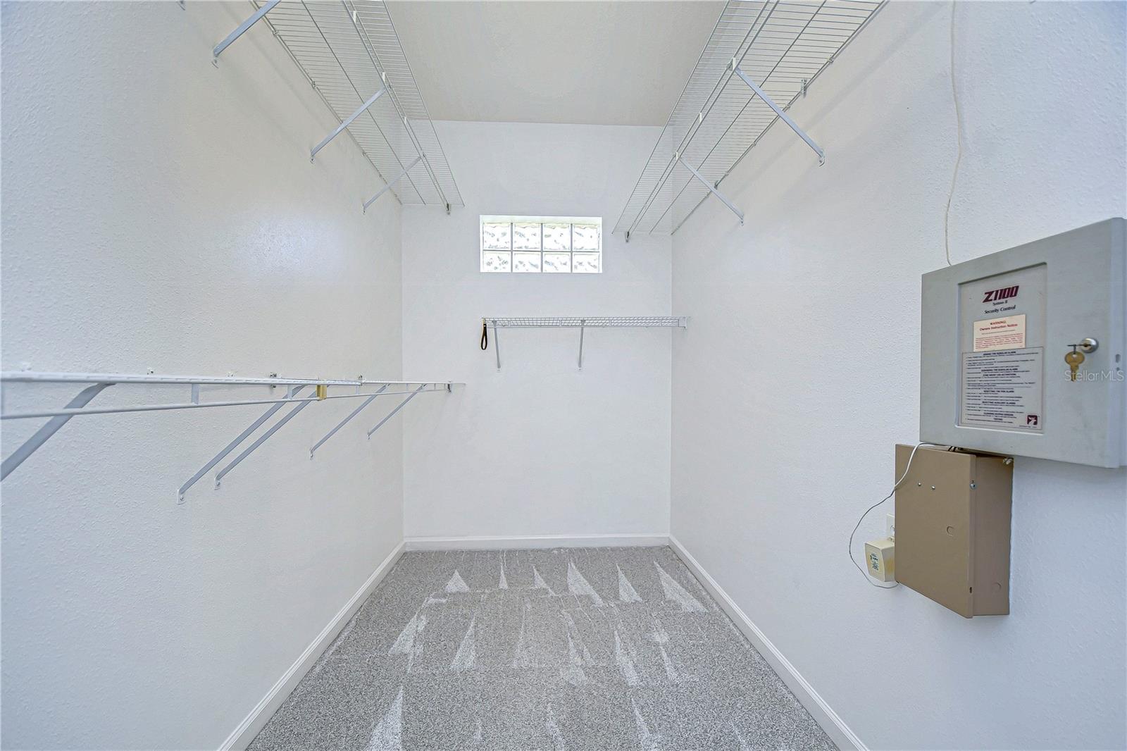 Spacious, bright, and ready to organize all your wardrobe dreams in this amazing closet.