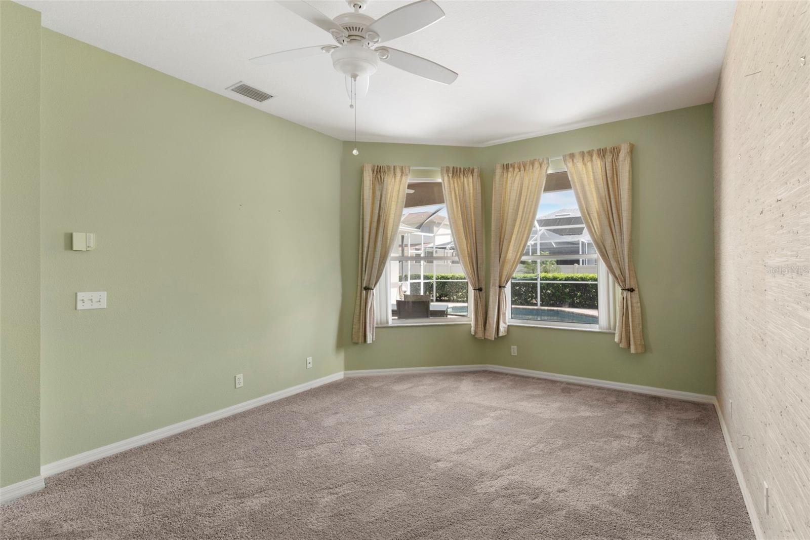 Primary Bedroom with Pool Views