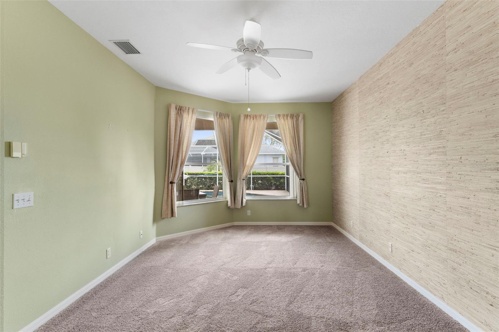 Primary Bedroom with Pool Views