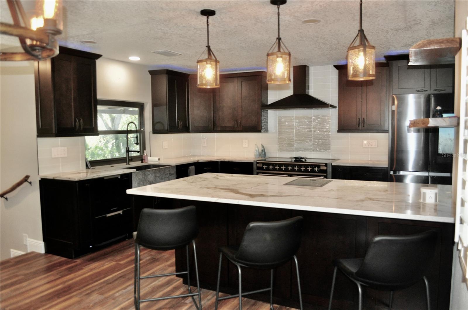 Gourmet kitchen with marble countertops