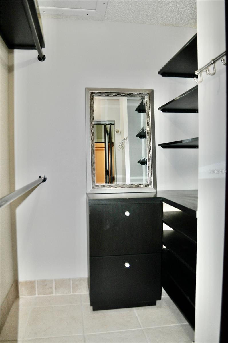 1 of 2 walk-in closets in master suite