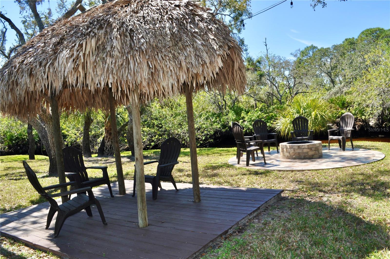 Tiki Hut relaxing pad offers a bit of tropical charm and the perfect retreat to enjoy a meal, sip a drink, read a book or unwind and take in the serene views