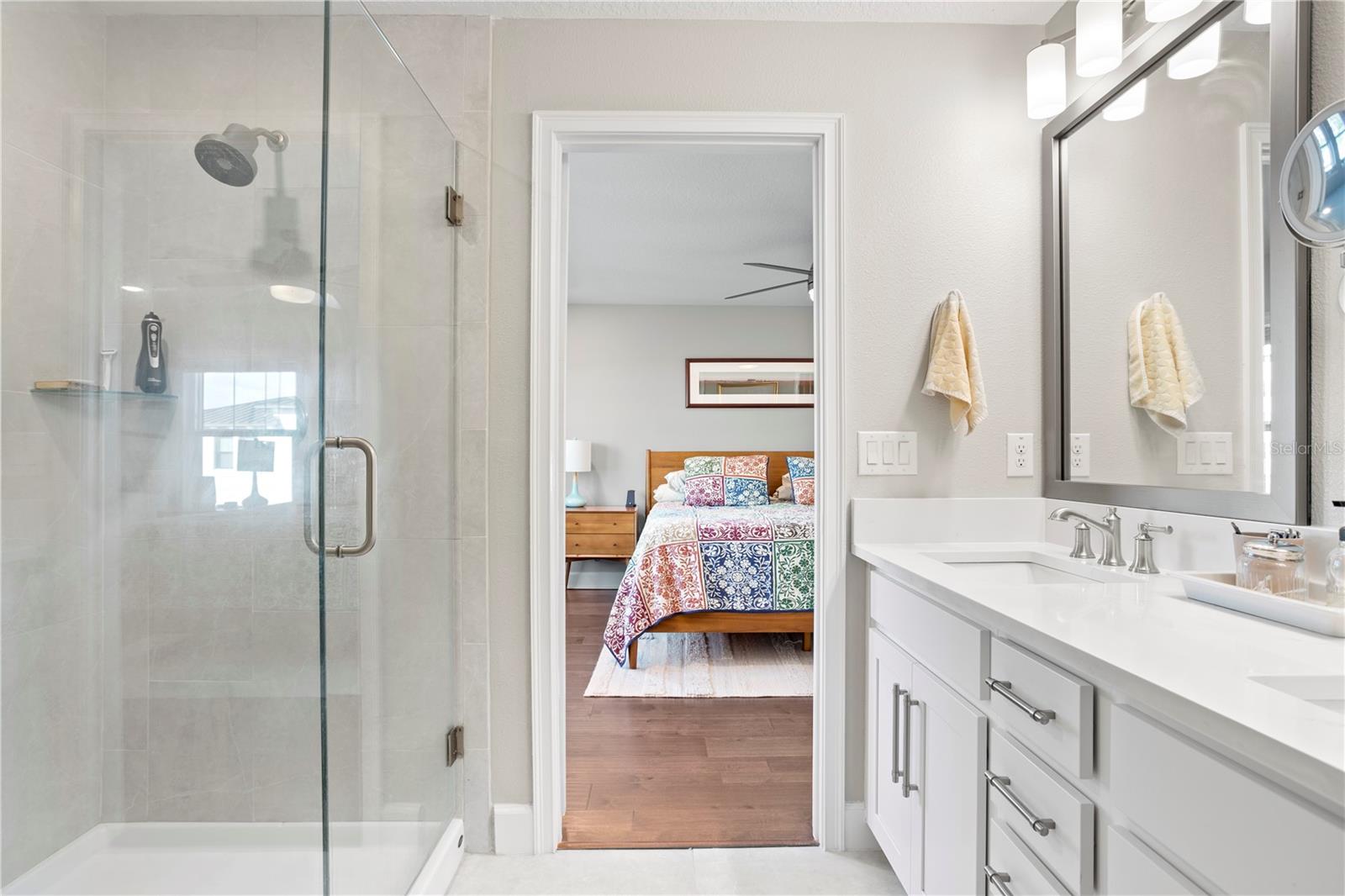 New frameless shower feature with filtered shower head.