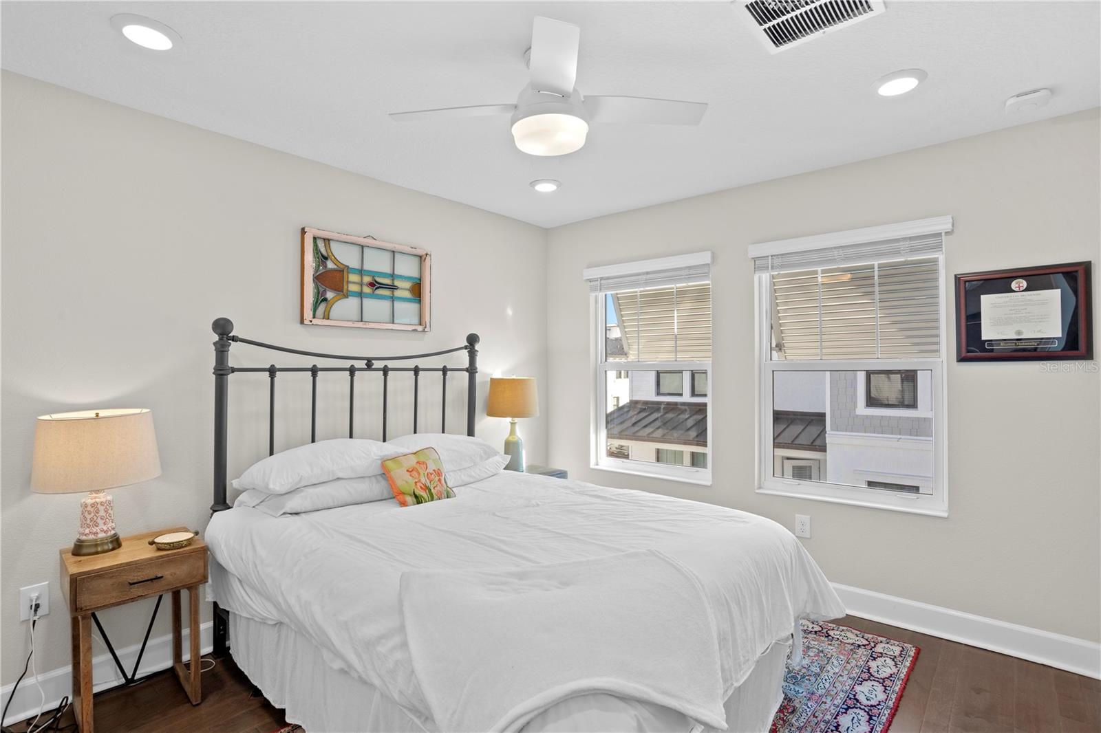 bedroom #2, fan and double wide closets.