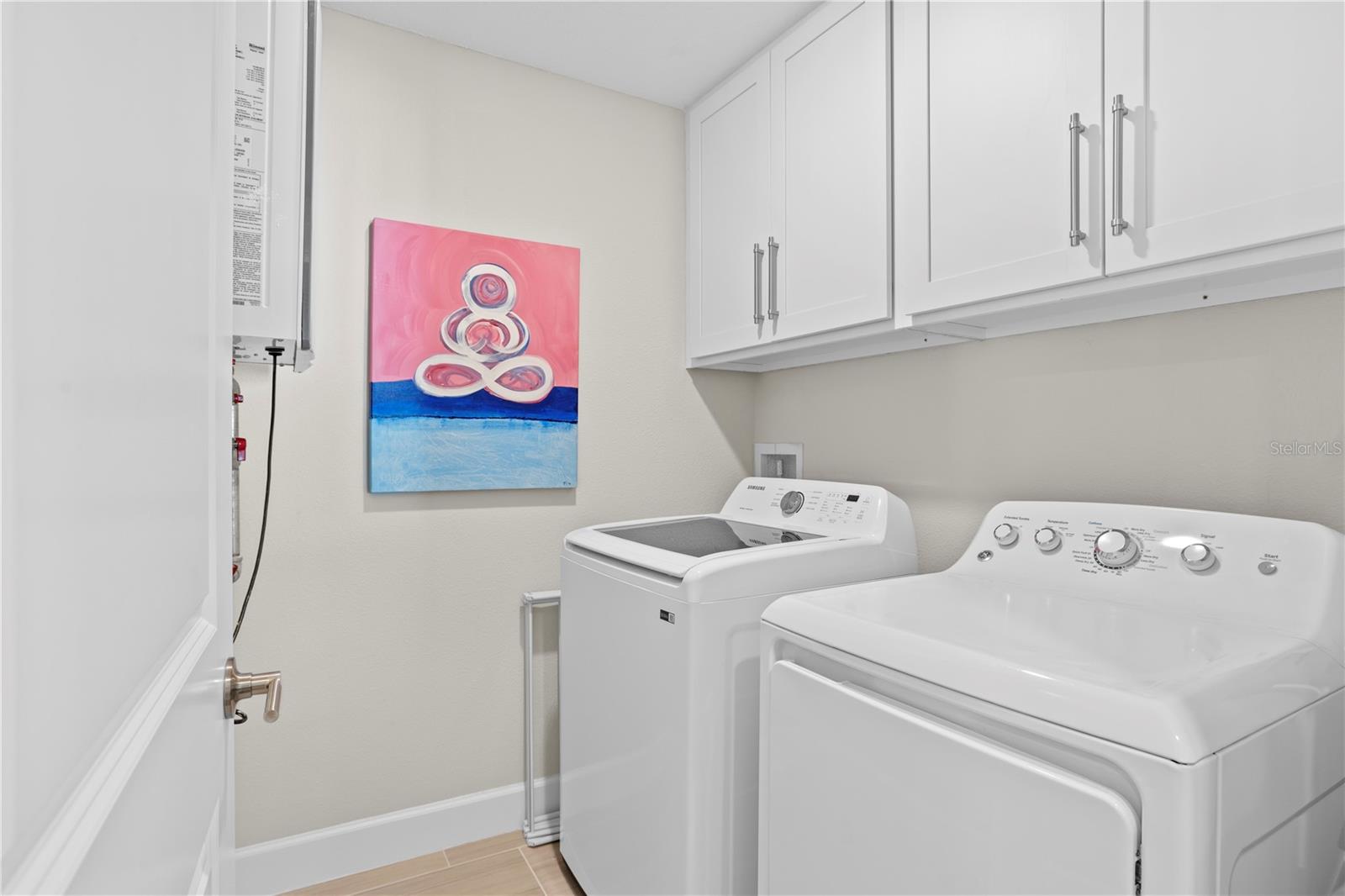 Laundry Area, tankless hot water heater