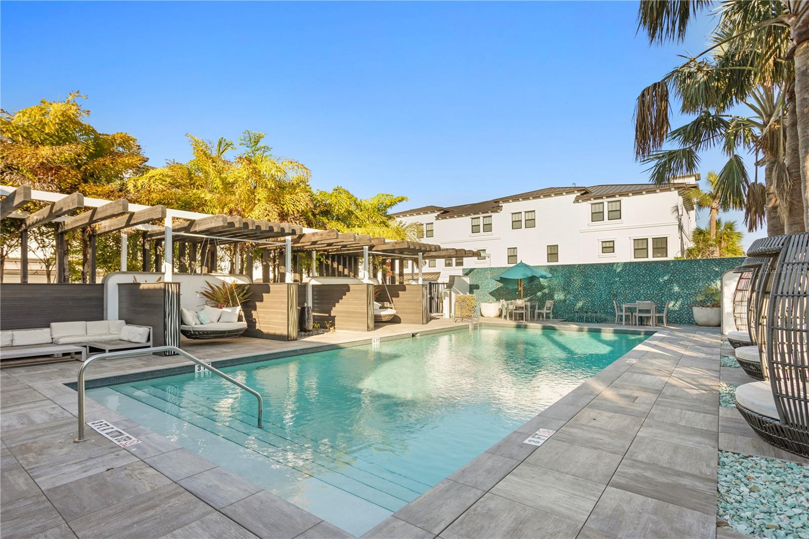 Resort Style Pool area with Cabana's and lounge seating.