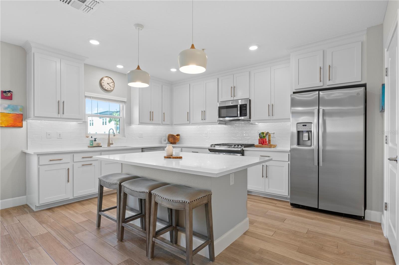 Kitchen sink with touchless faucet.