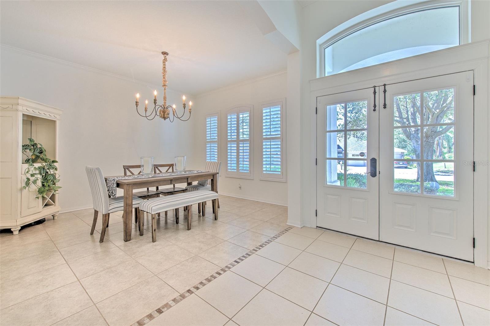 Sitting area to the left of foyer. Can easily be closed in for an extra office or flex room!