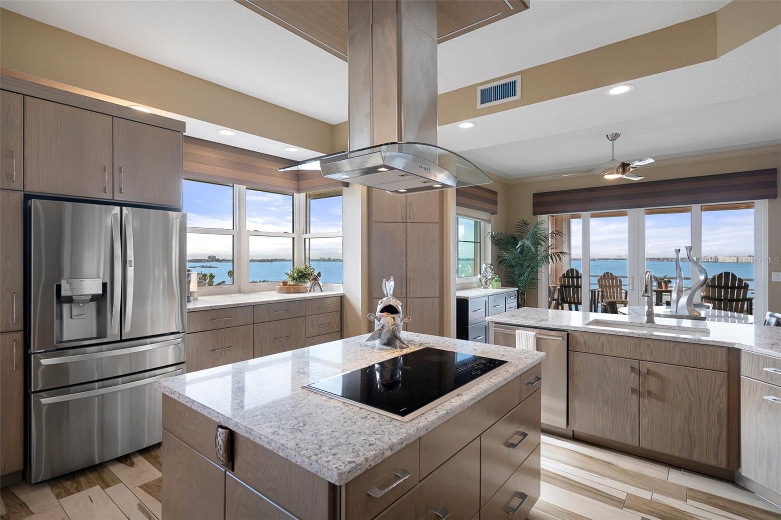 A Kitchen for the Gourmet! Extensive Cabinetry Provides Storage and while Windows Illuminate Your Work