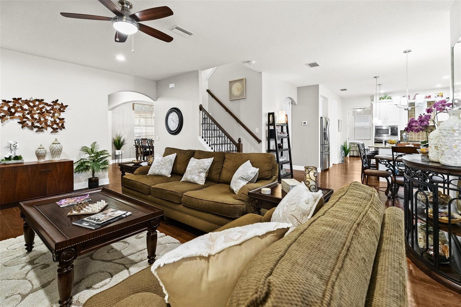 Great room looking to entry and kitchen