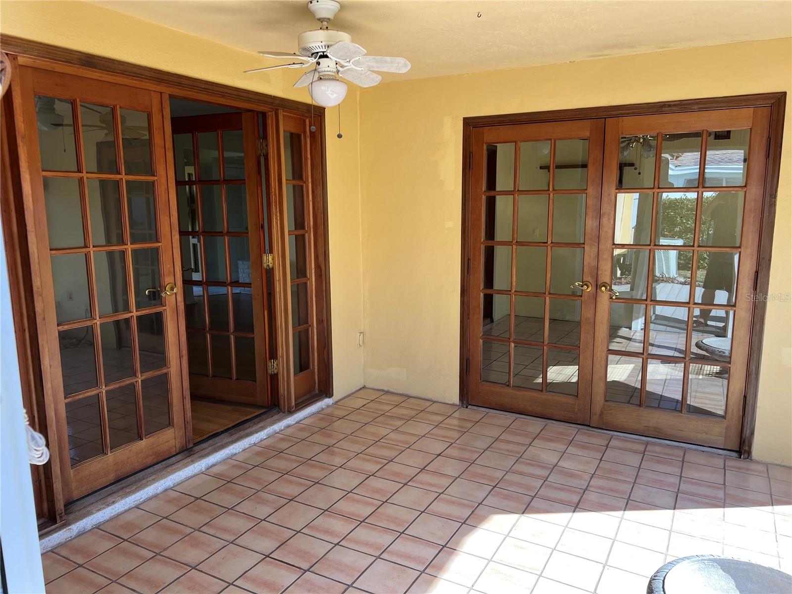 Spacious patio. Open french doors and enjoy a  3 season room.