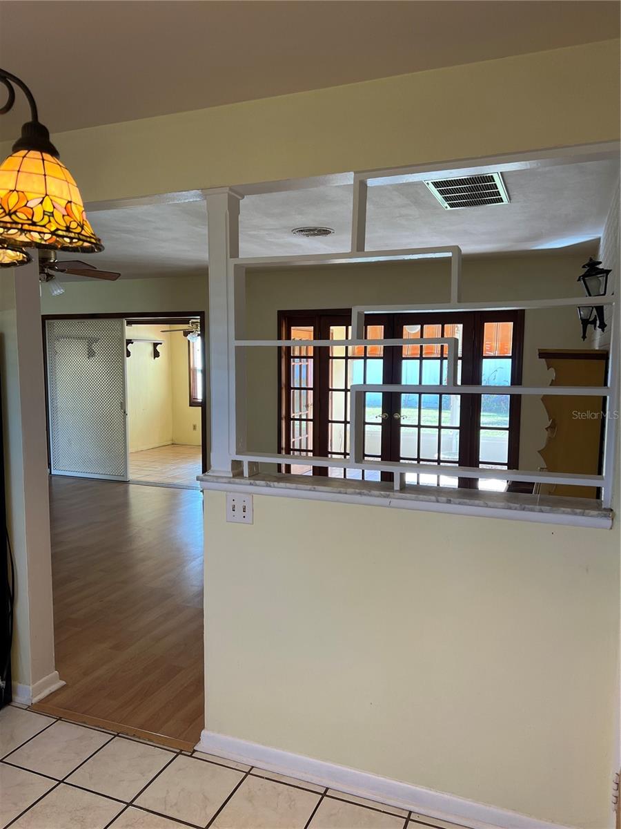 Kitchen overlooking livingroom.