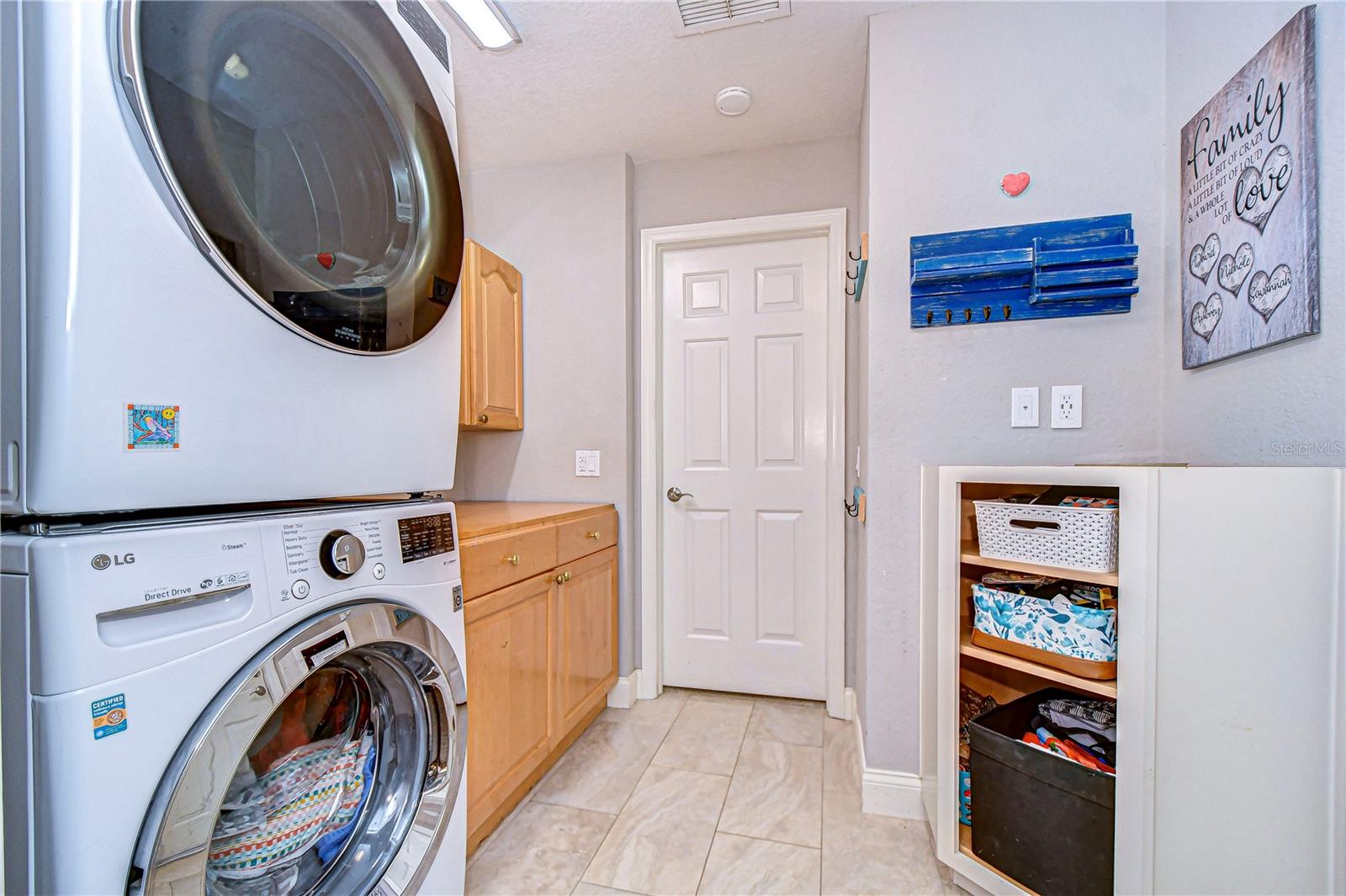 Laundry day just got an upgrade! Enjoy a sleek and efficient laundry room, where everything's organized