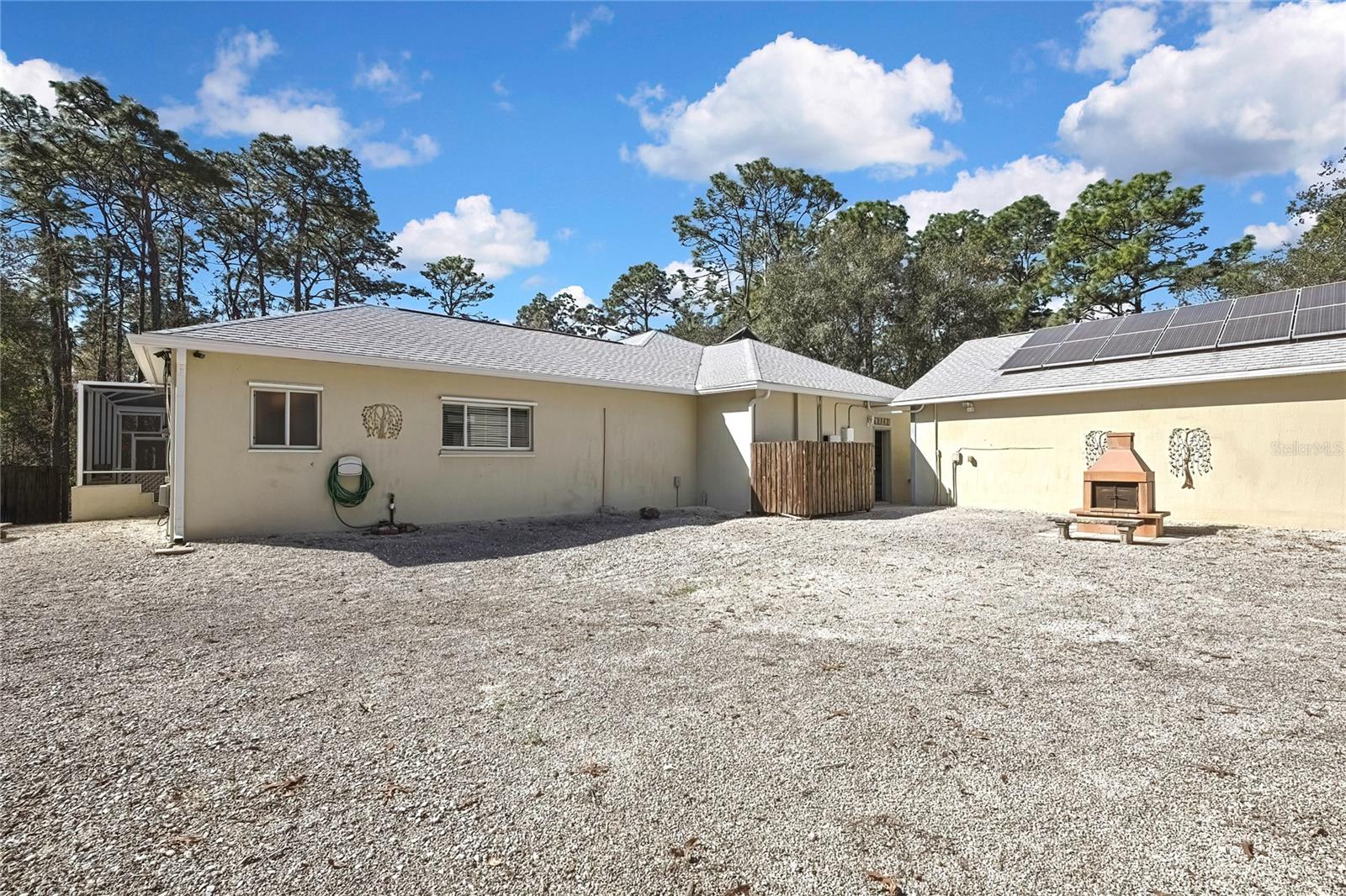 Back of House and Seperate 7 Car Garage - Outdoor Stove