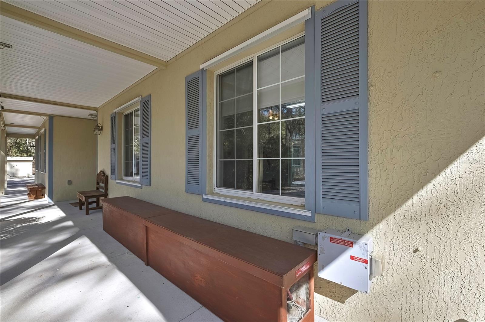 Front Of House (windows for 4th Seperate Room with Closet and Bath. Battery Pack for Solar.