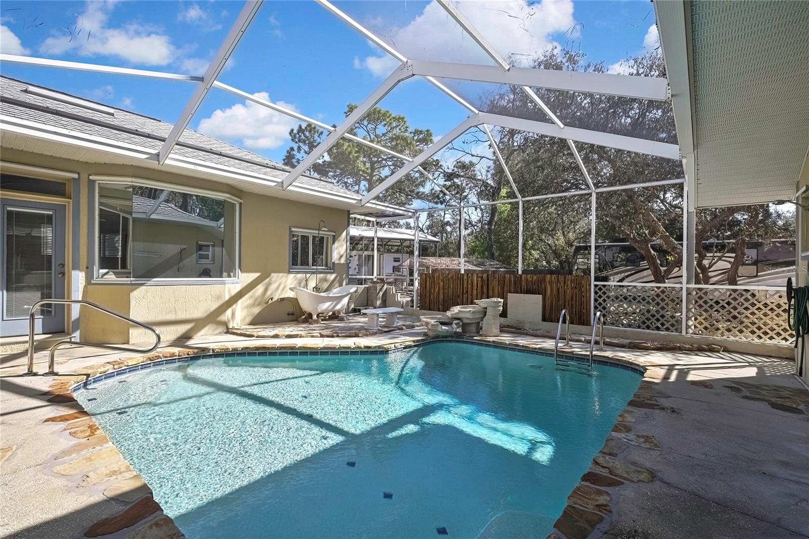 Pool Area - master windows and door