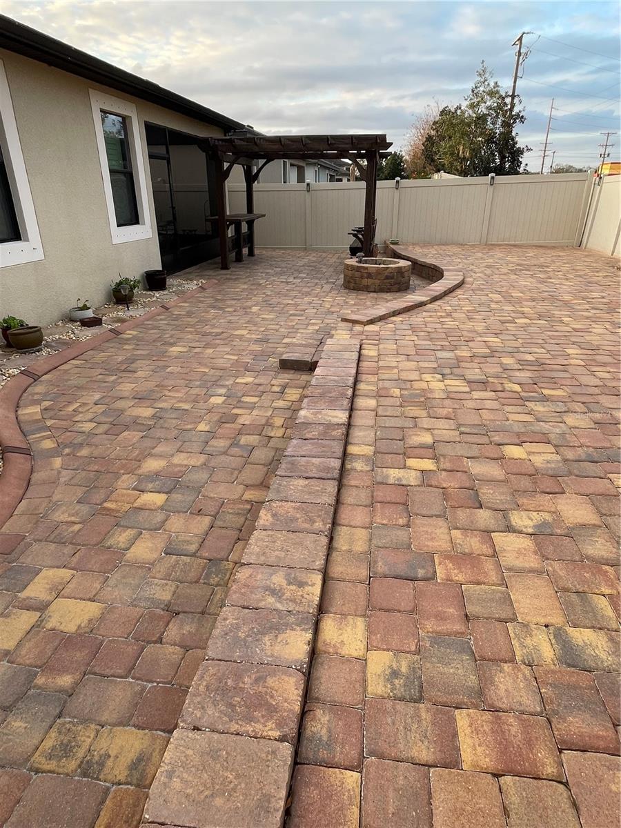 Fire pit & paved back yard