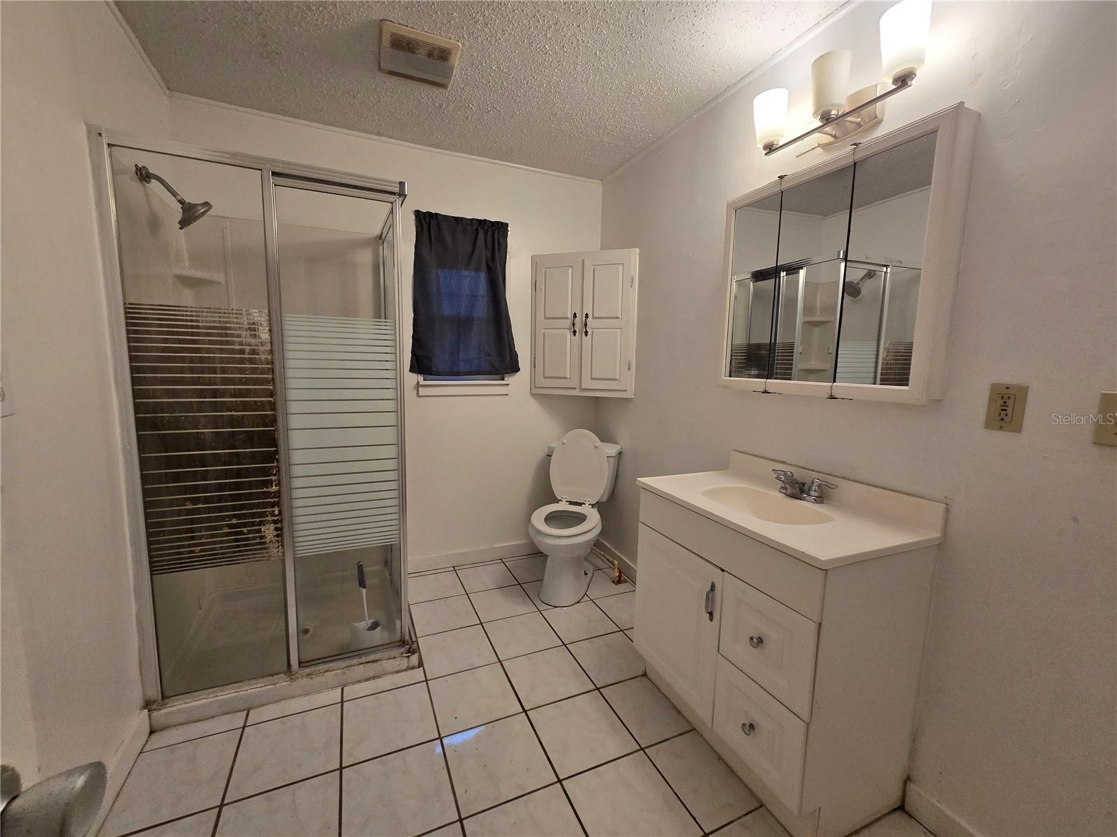 Bath 1 with access to Primary Bedroom