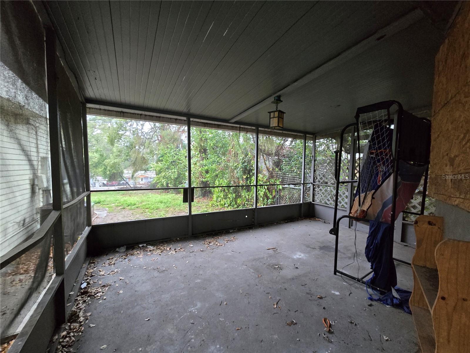 Screened Porch attached to outdoor shed/workshop
