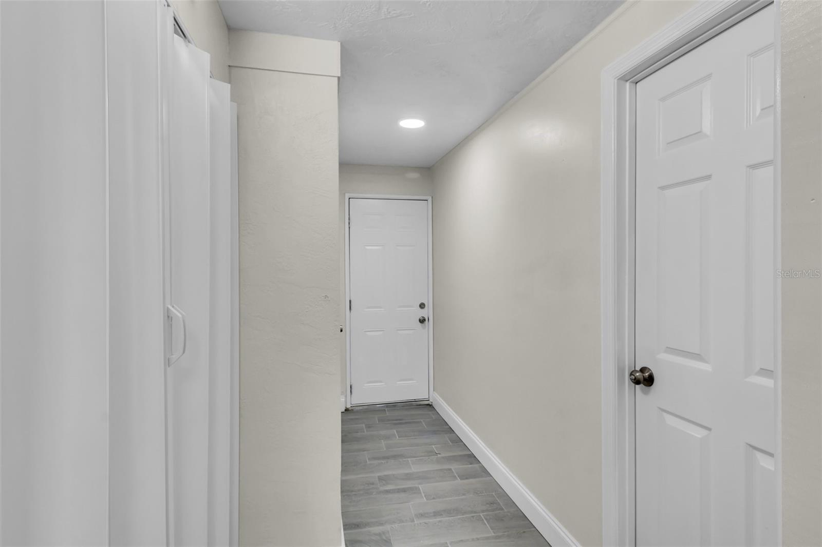 hallway to garage and laundry