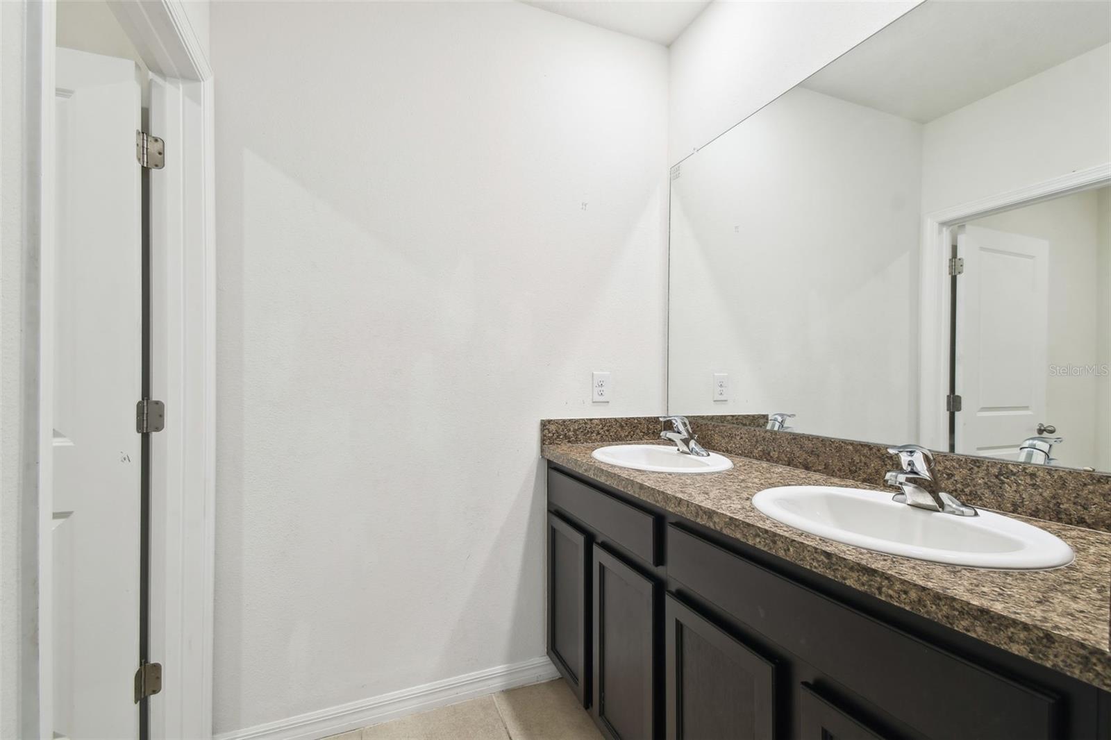 Upstairs Full bath with double sinks