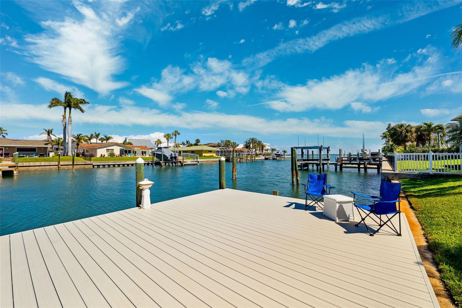 Expansive Dock with shore power and room for a 60 ft vessel.