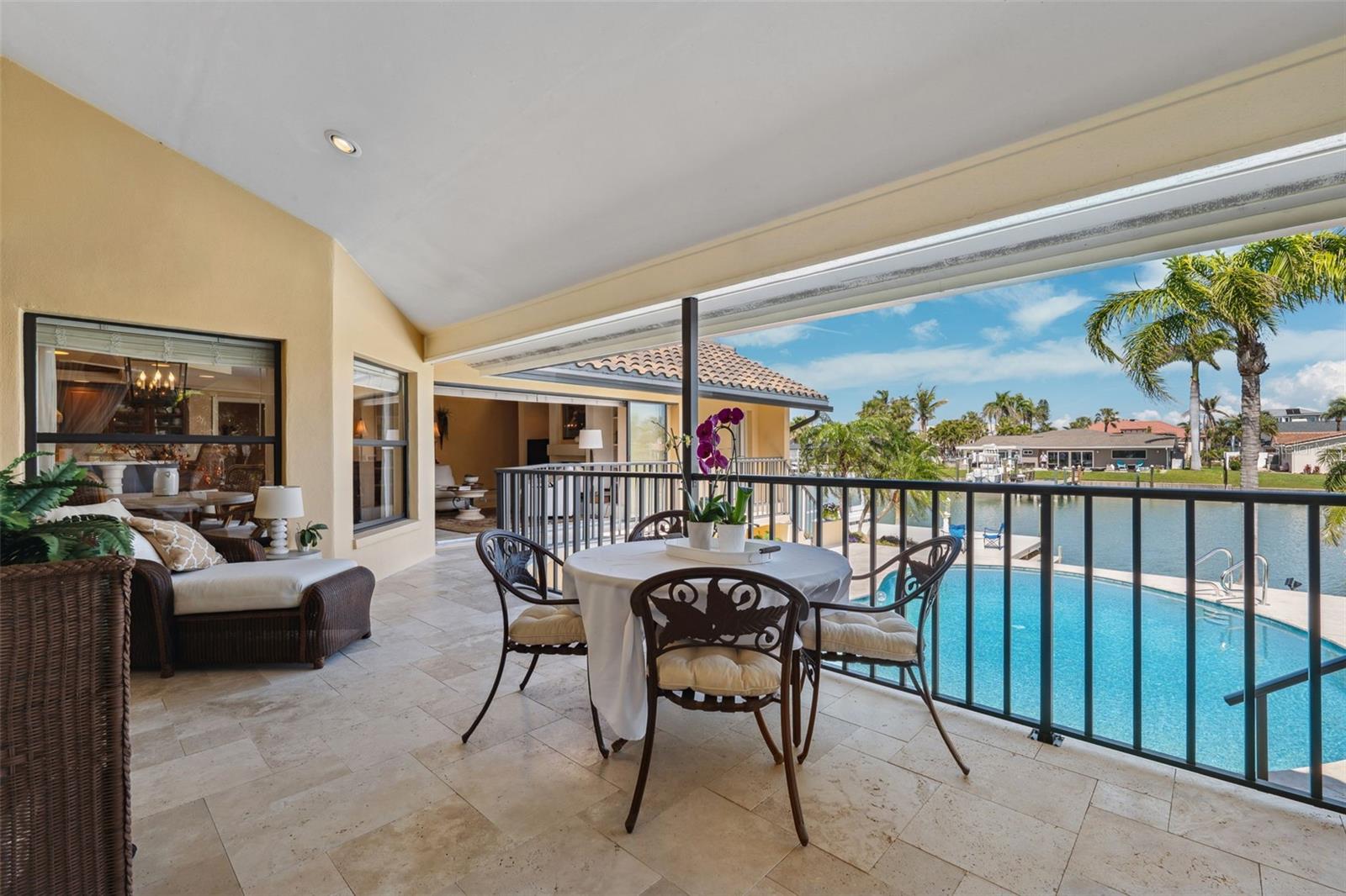 Walls of pocket sliding doors create a seamless flow to the outdoor living areas.