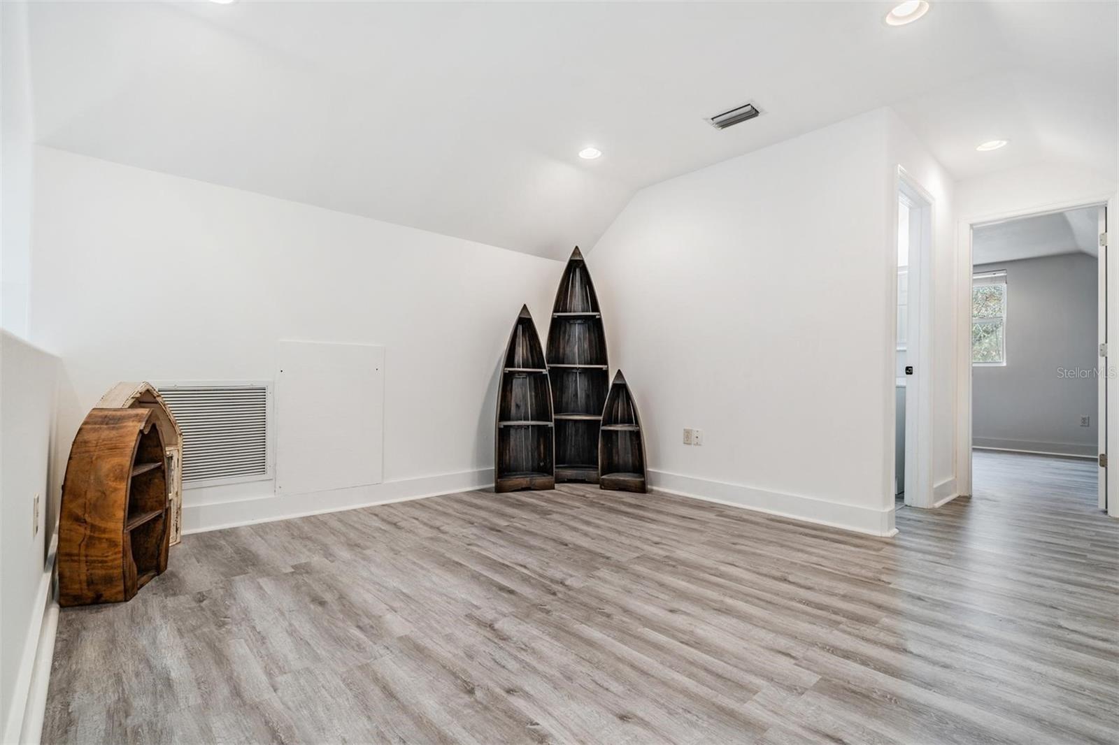 Open loft area at the top of the staircase in between the 2 bedrooms