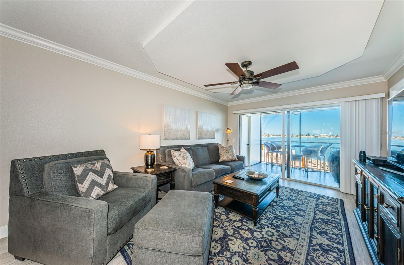 ain Living Area with Architecturally Enhanced Ceiling and Gorgeous Water View!