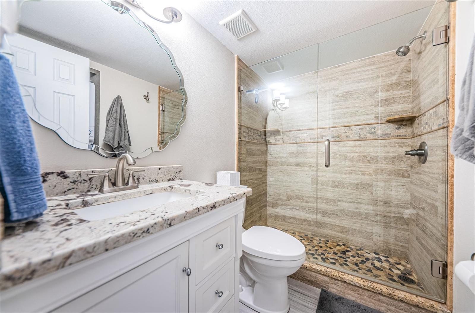 Guest Bath - Granite CT's and Beautifully Tiled Shower