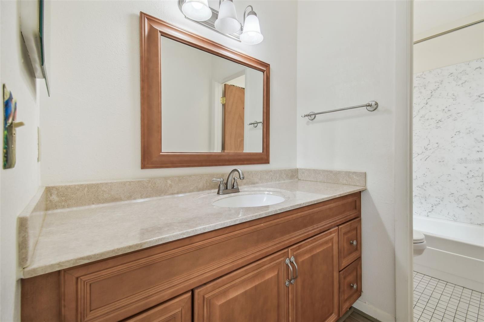 Vanity area in primary bathroom