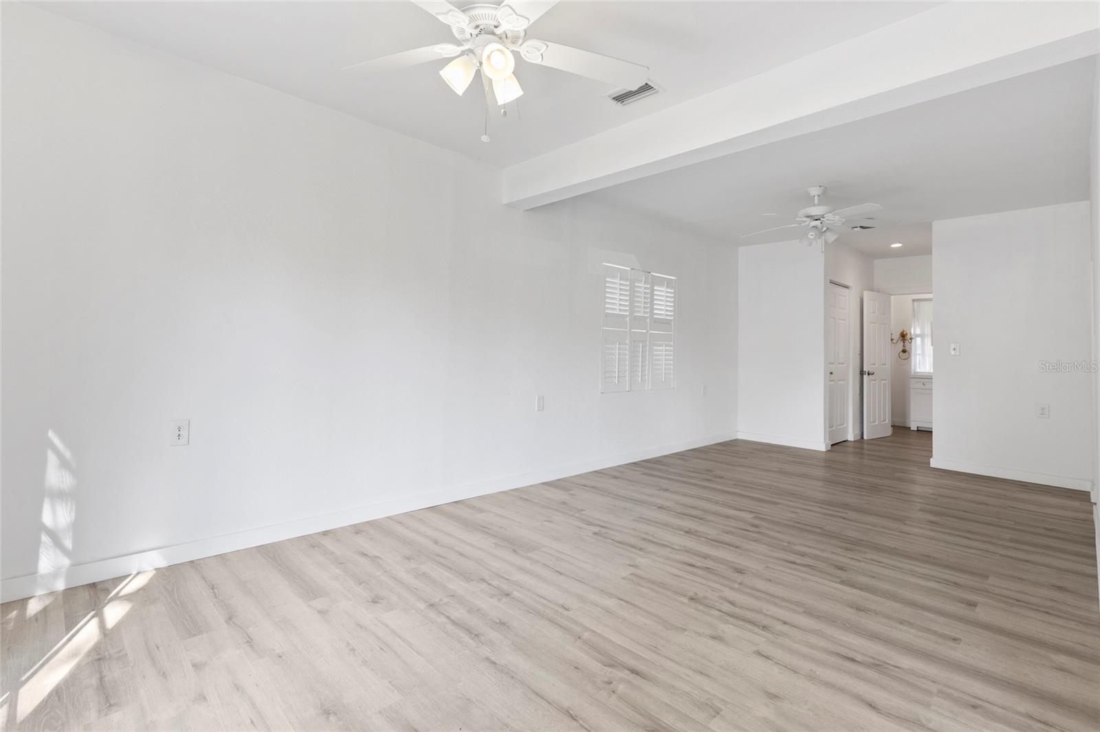 Dining Room. Bathroom & laundry towards the back.