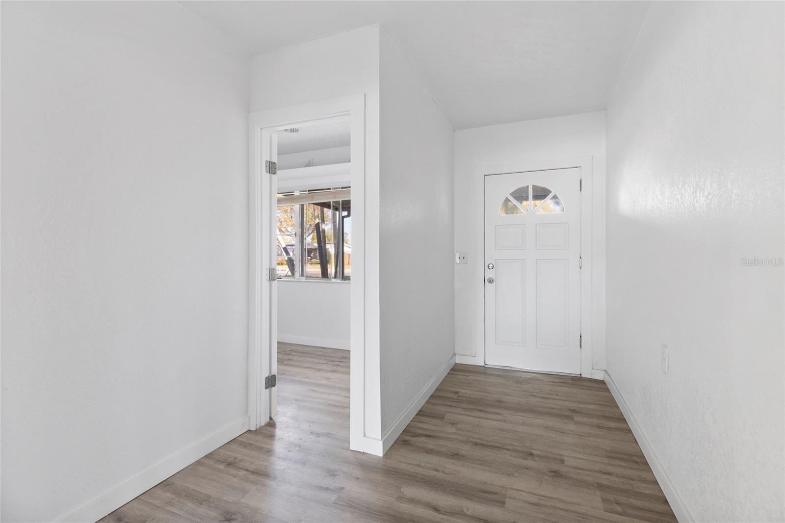 View from living room towards the bonus room & the front door.