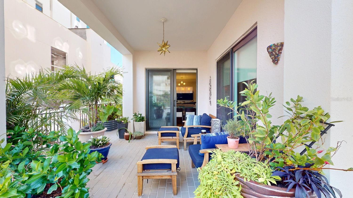 View to the covered patios, and the sliding doors to living and master !