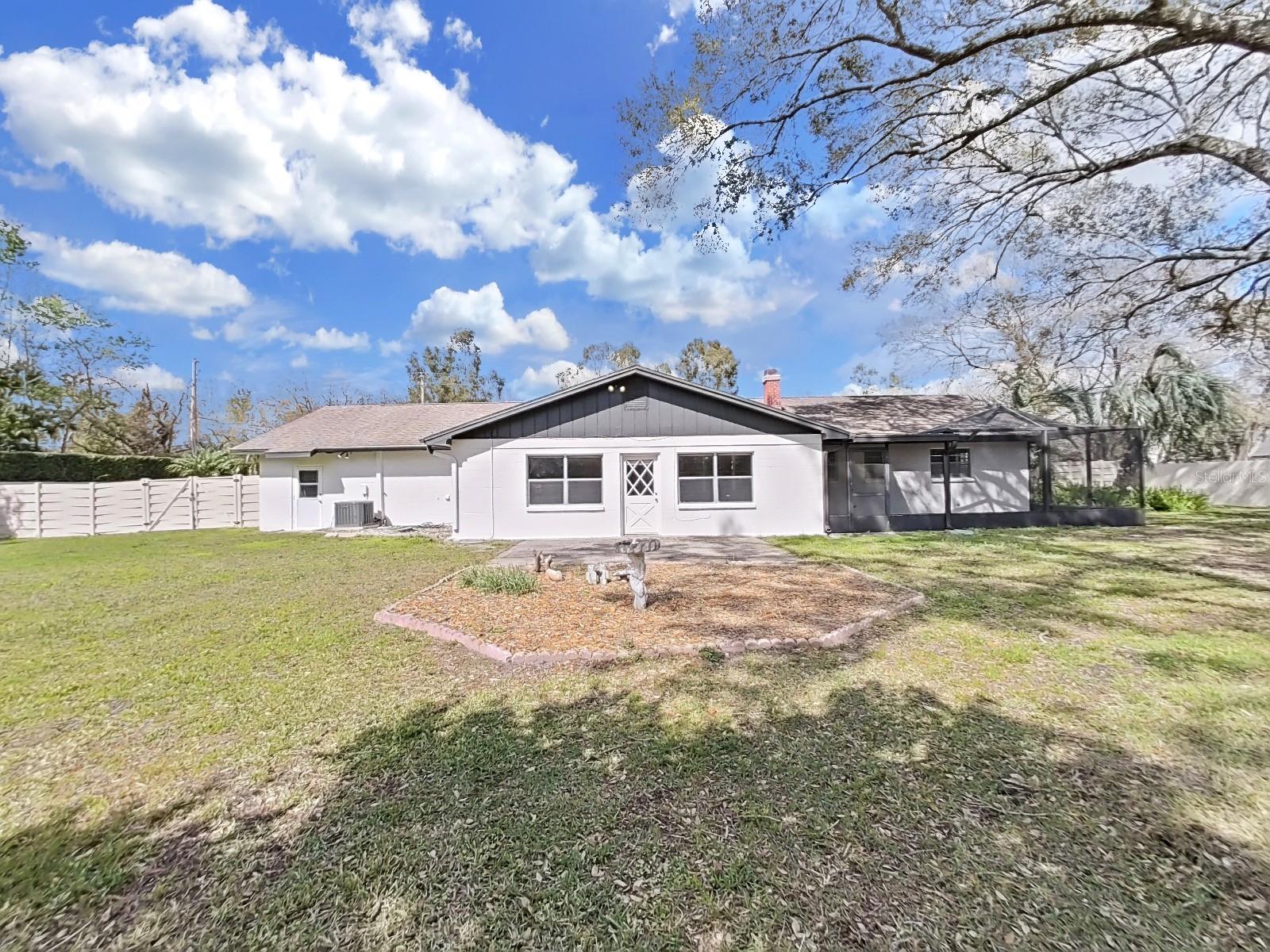 Rear of home with 14x17 open patio.