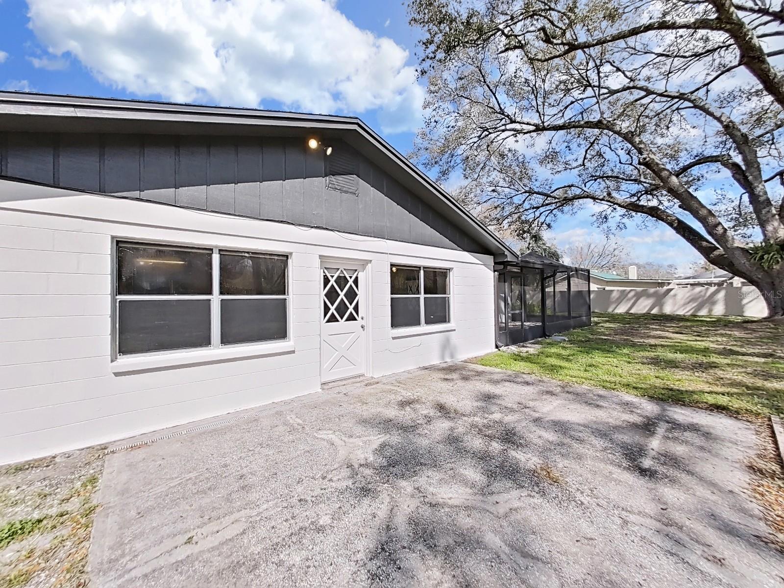 Rear Patio leading into the Florida Room.