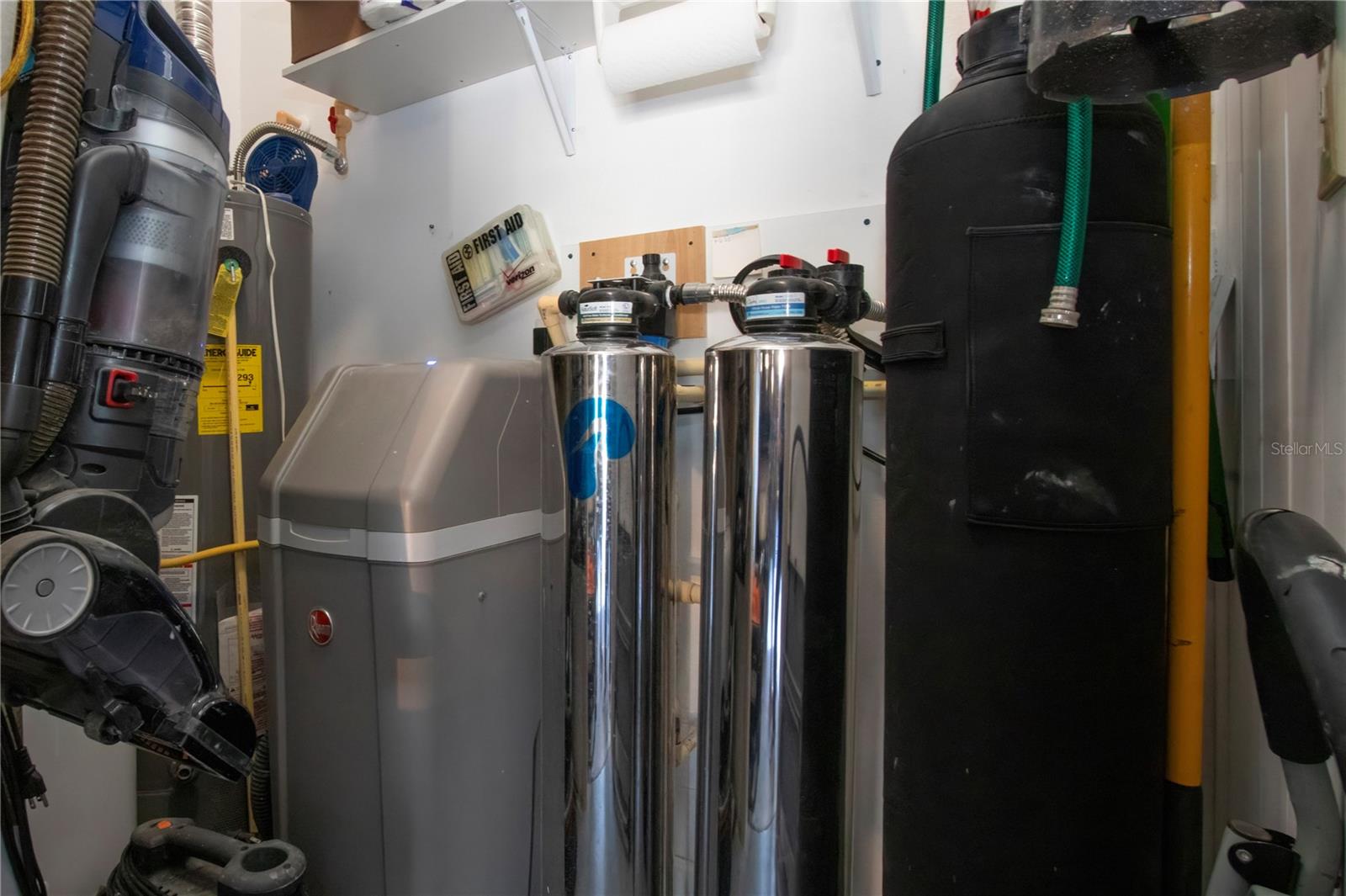 Whole house water treatment system located in special garage closet