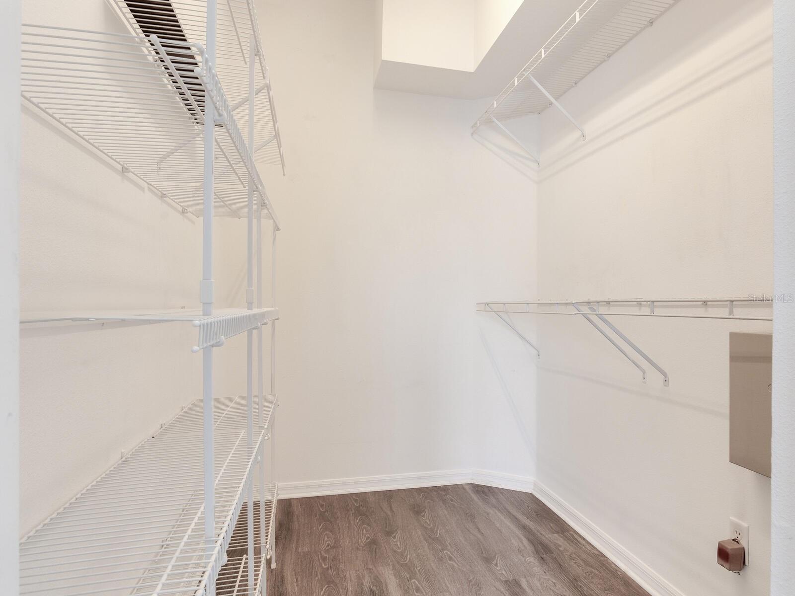 Primary Bedroom walk-in closet