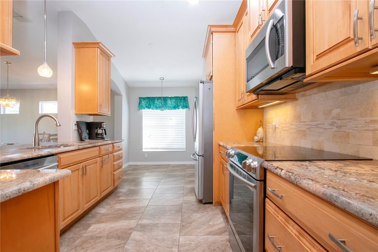 Kitchen w/Breakfast Nook beyond