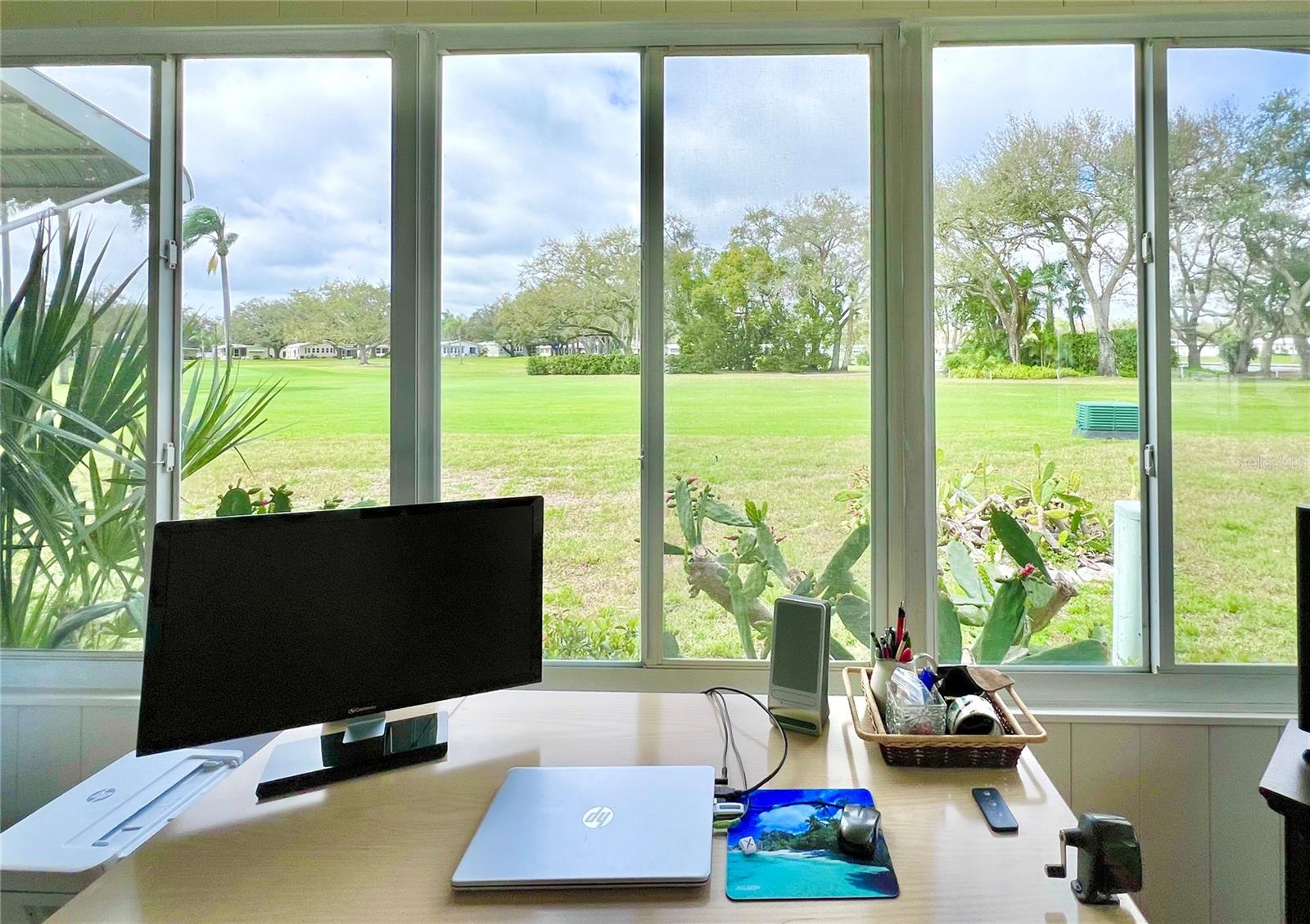 Florida room With office overlooking golf course