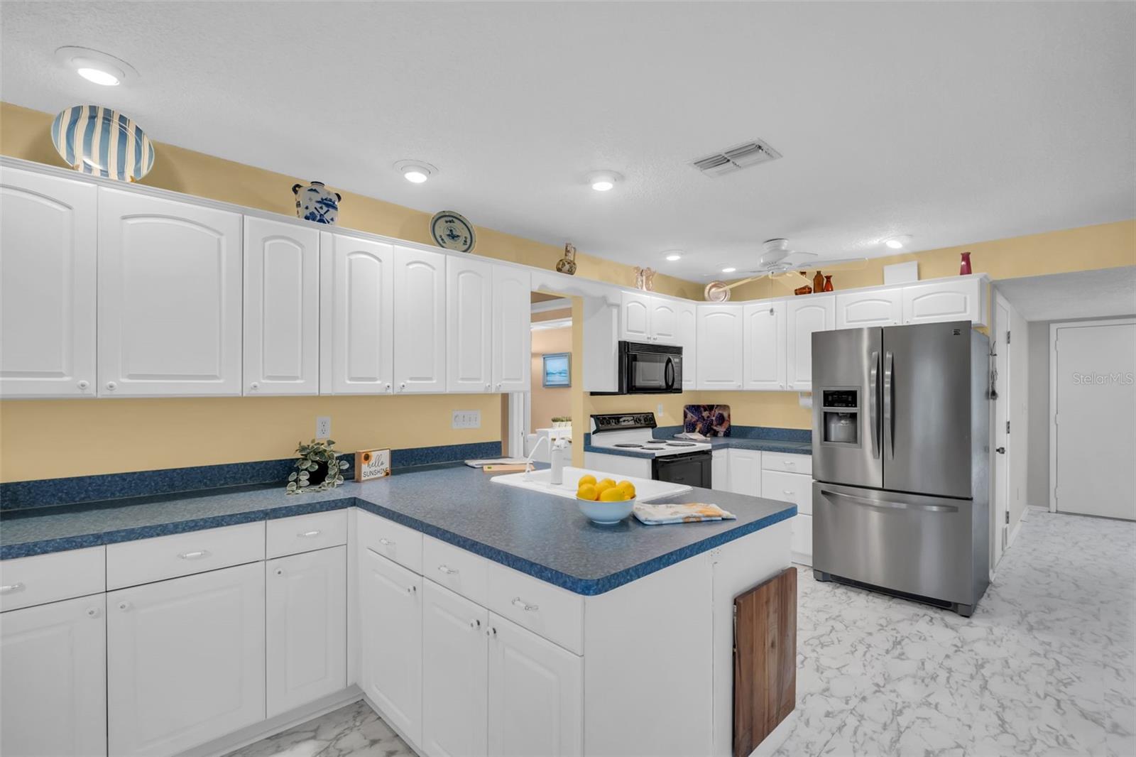 Wow!! Newer cabinets and more cabinets - with self-closing drawers~