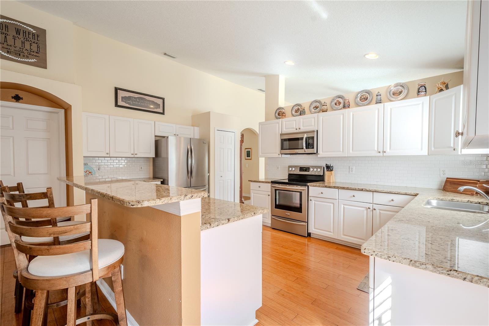 The kitchen features a breakfast bar.