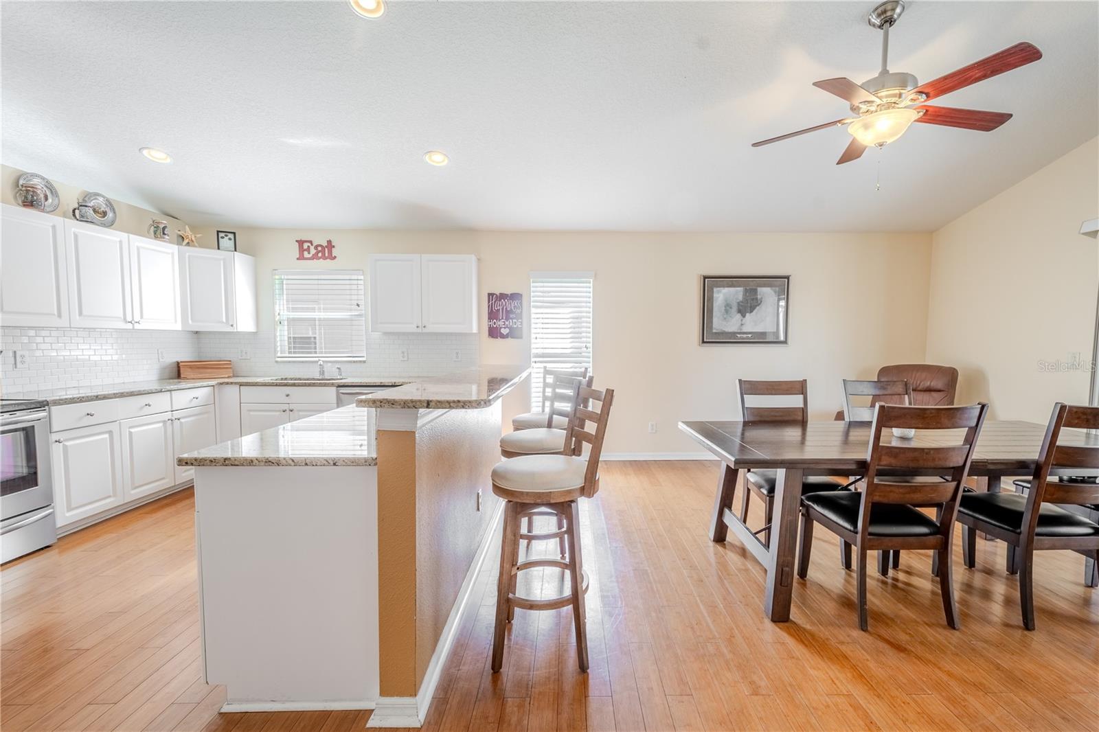 The kitchen flows seamlessly to the family room.