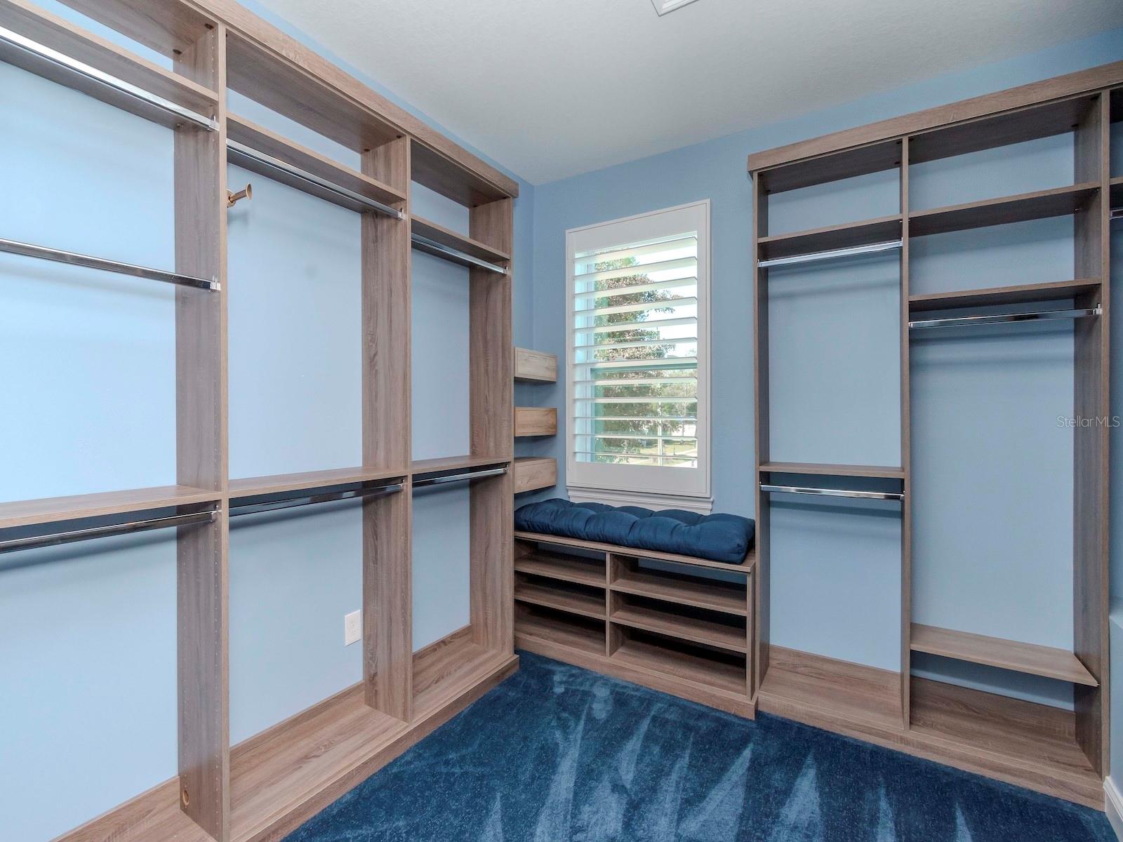 MASTER WALK IN CLOSET #1 WITH CUSTOM SHELVING