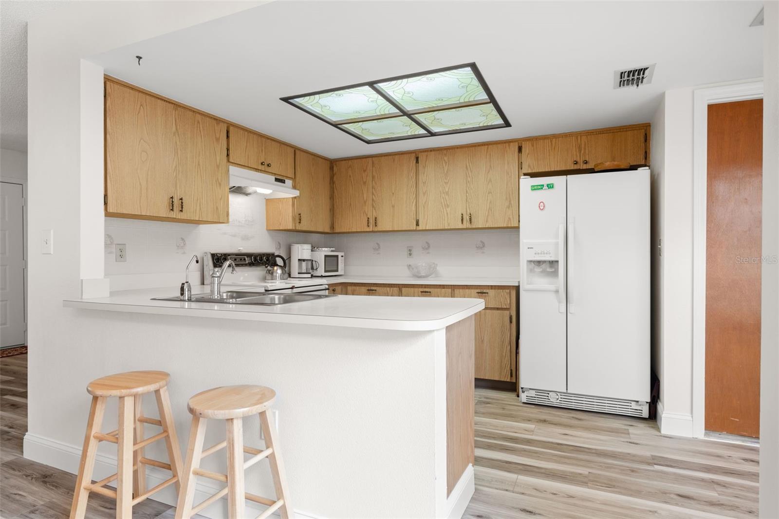 Open kitchen with breakfast bar feature