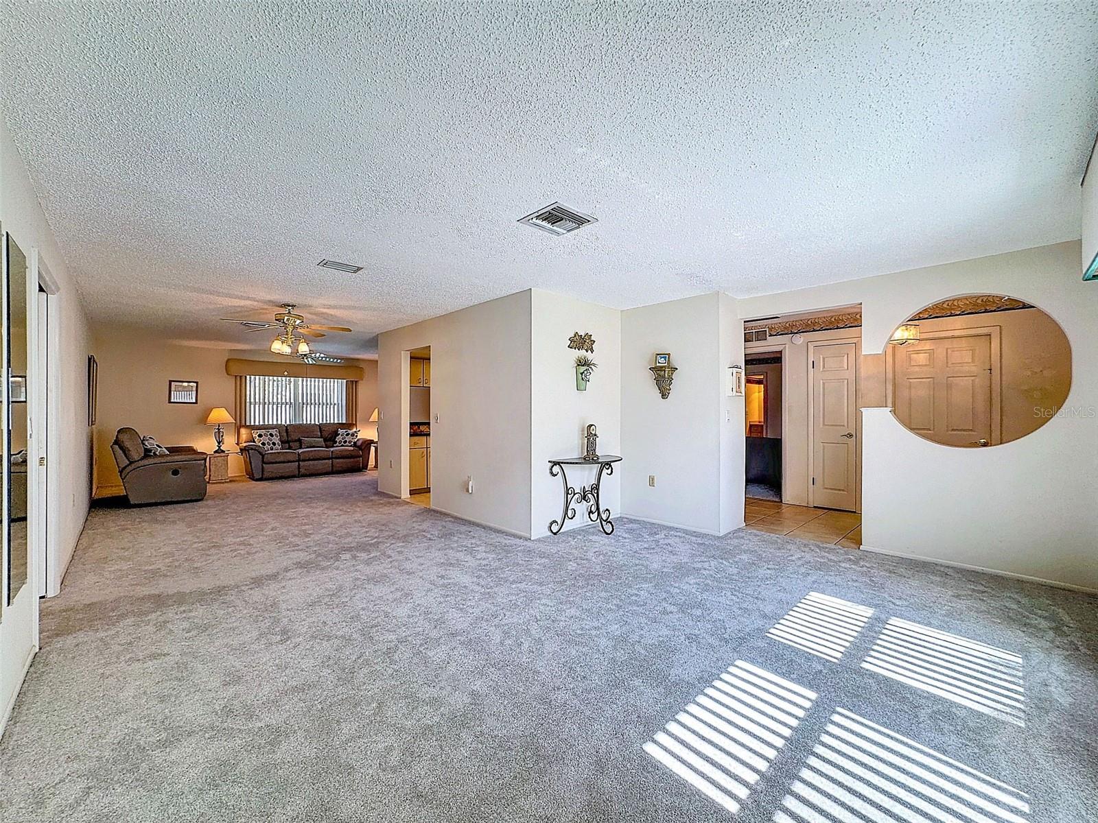 Living Room to Dining area to Family Room