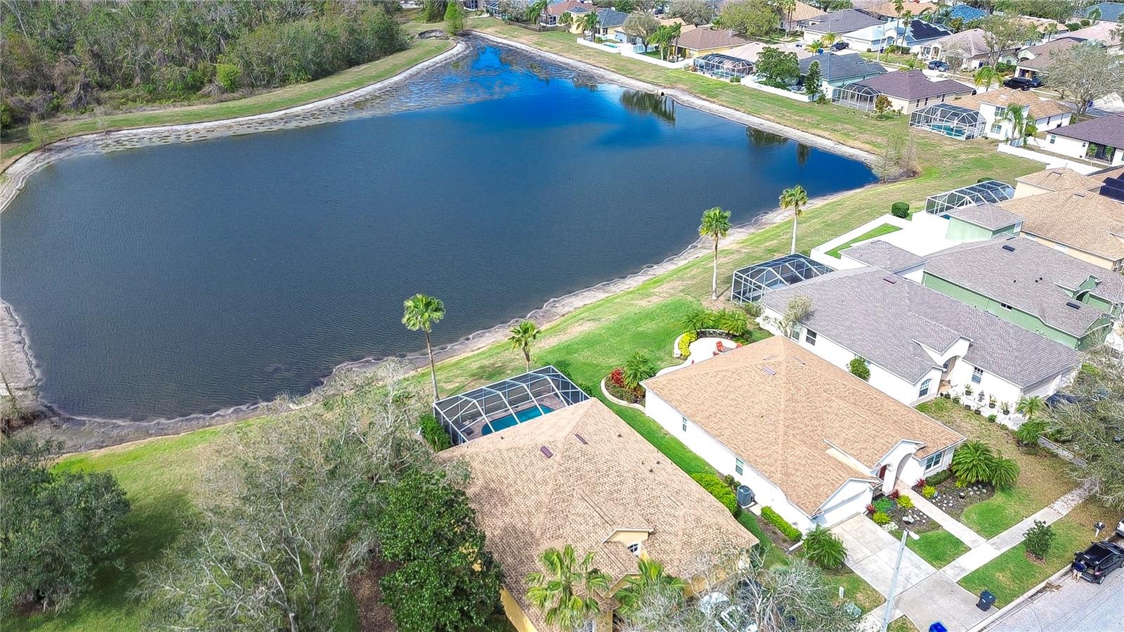 This charming oasis offers picturesque water views and lush surroundings