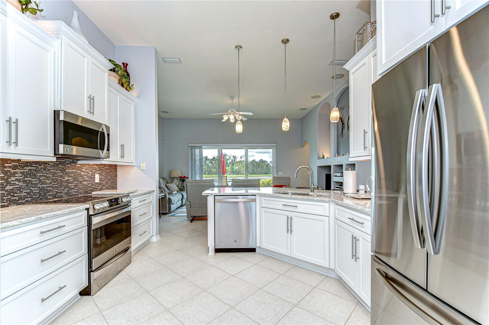 Modern elegance meets functionality in this spacious kitchen